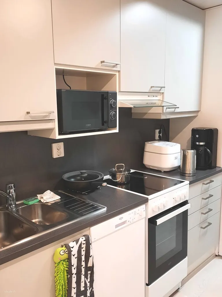 Kitchen - Modern Flat with Balcony in Lahti