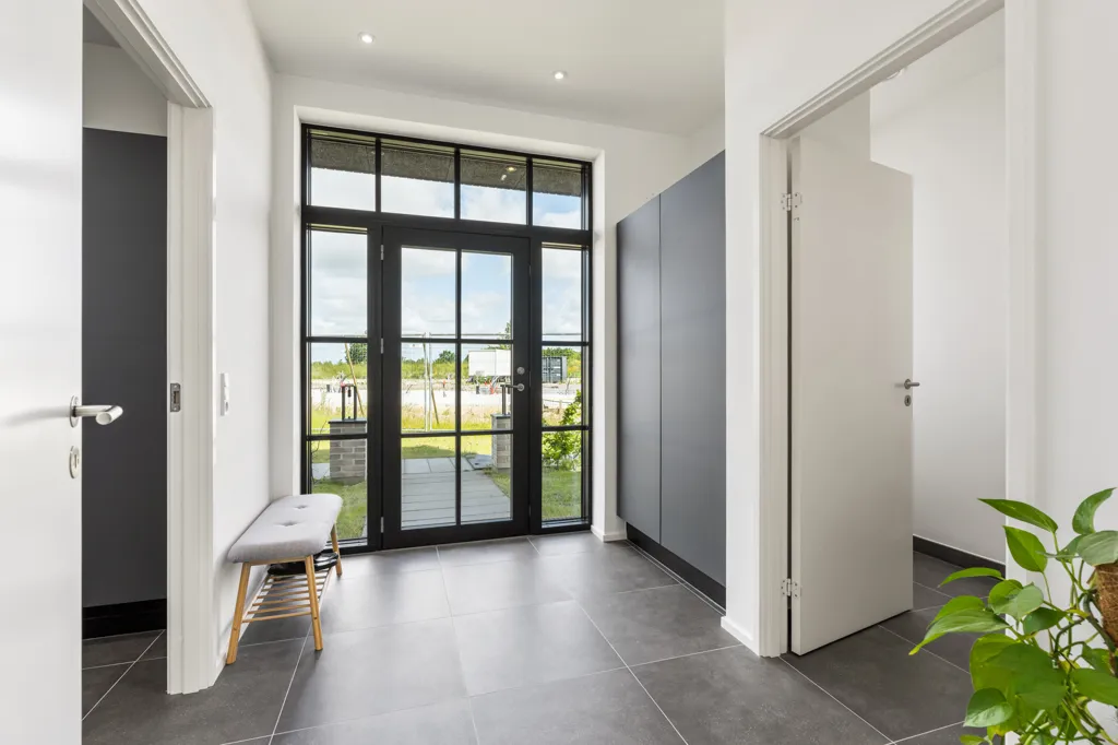 Esik - Modern Rowhouse with South-Facing Garden in Paderup
