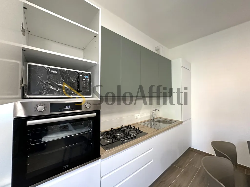 Kitchen - Ristrutturato Appartamento with Balcony in Forli'
