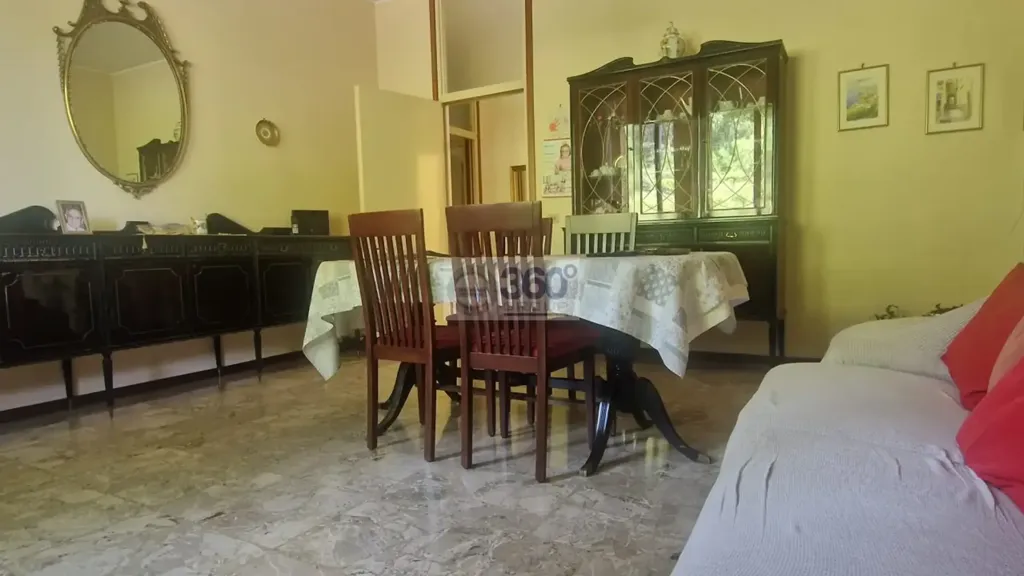 Salle à manger - Quadruplex Apartment with Garden View in Brescia