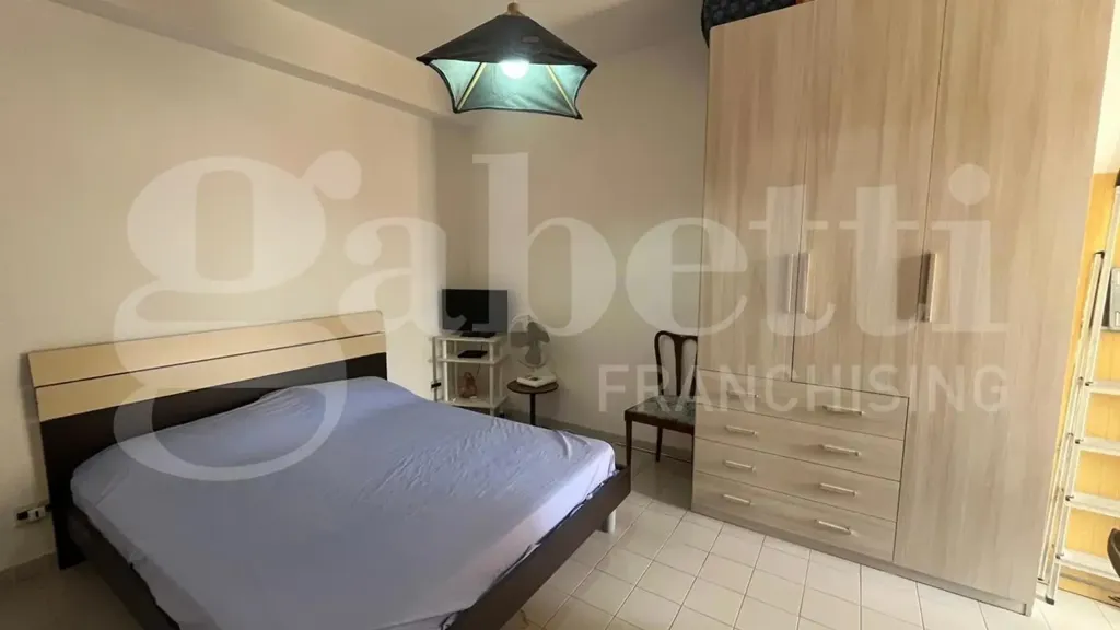 Chambres - 3-Bedroom Apartment with Balcony in Scalea