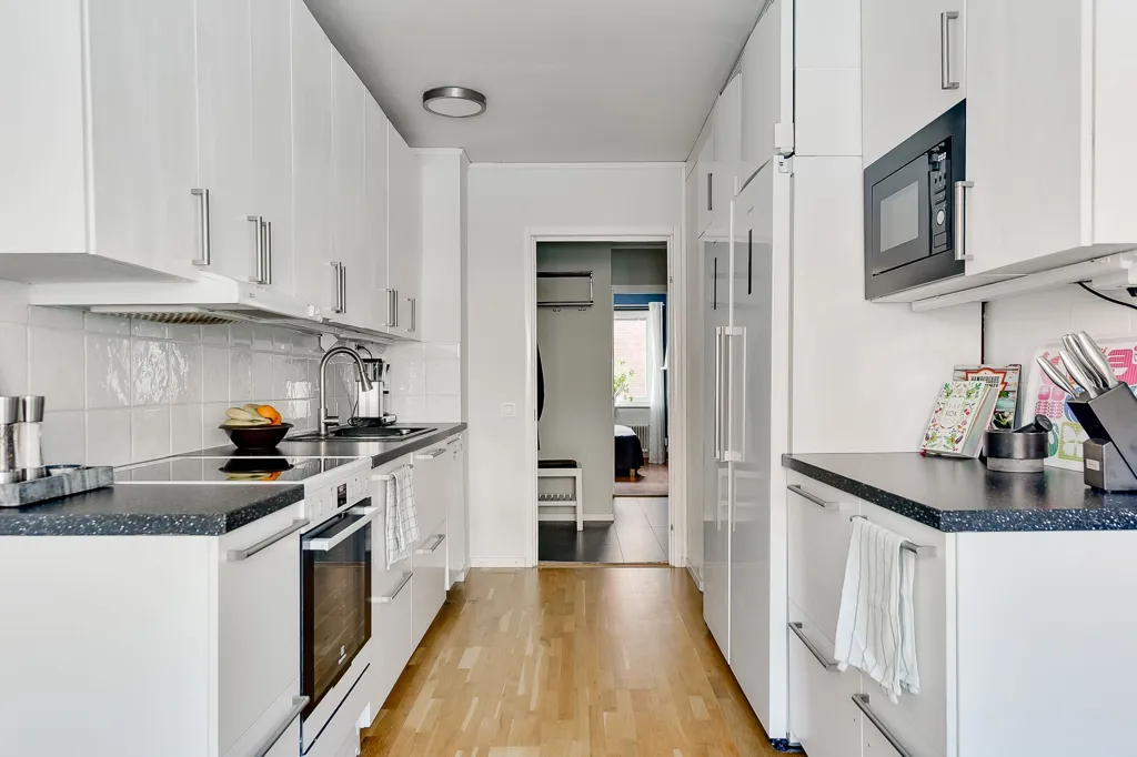 Kitchen - Three-Bedroom Apartment with West-Facing Balcony in Umeå