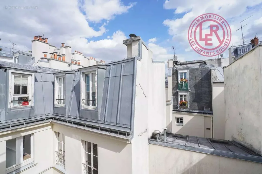 Terrasse - Appartement 2 Pièces avec Vue Dégagée au Marais