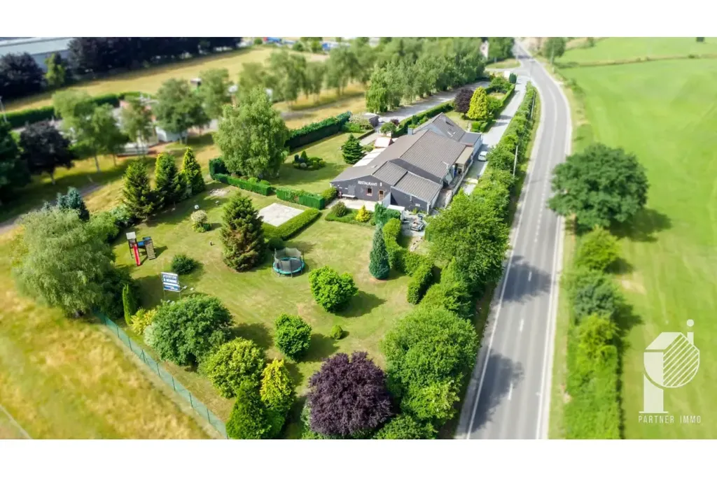 Õhuvaade - Mixed-Use Building with Residential and Commercial Space in Stembert