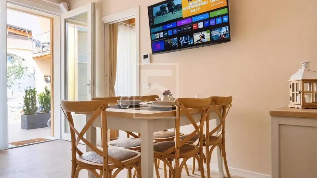 Dining Room - Restored Triplex with Garden View in Manerba del Garda