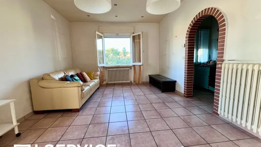 Séjour - Three-Bedroom Apartment with Balcony in Cervia