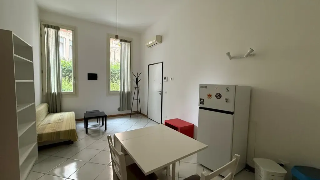 Living Room - Modernised Two-Bedroom Apartment in Bologna