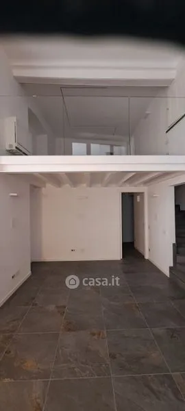 Living Room - Elegant Trilocale with Private Patio in Como