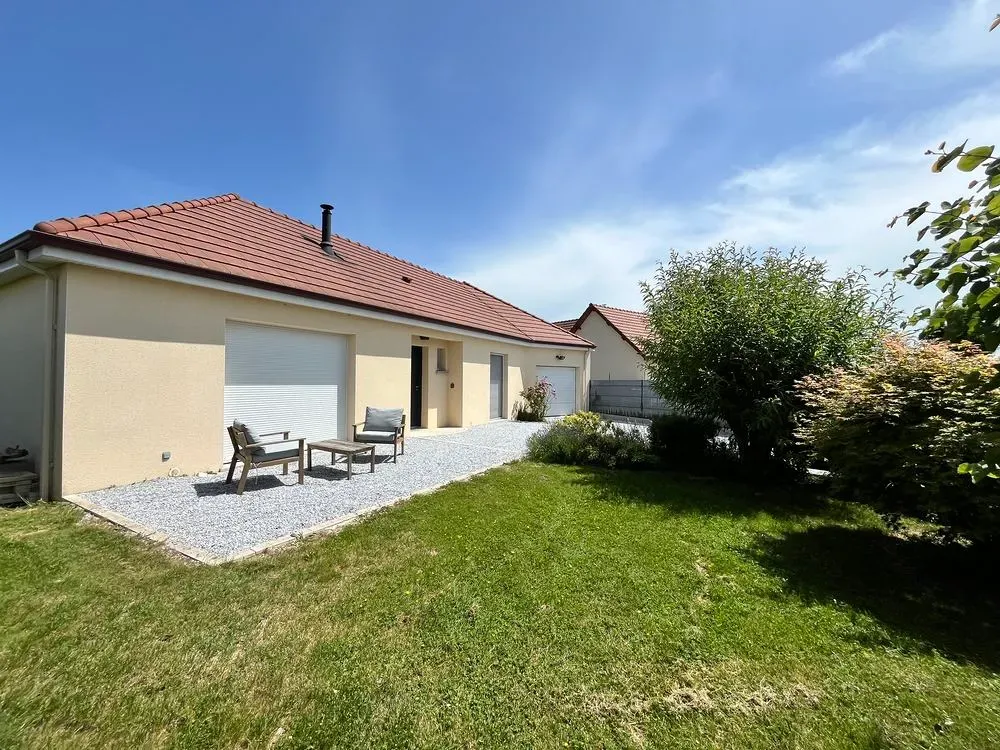 Jardin - Maison Plain-Pied avec Jardin et Garage à Proximité des Écoles
