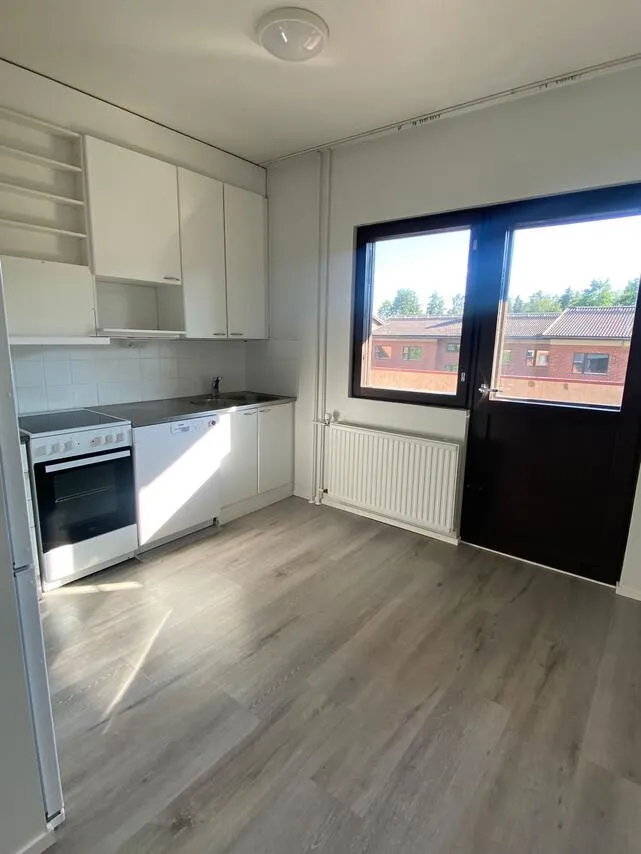 Cucina - Modernised Apartment with Balcony in Kuopio