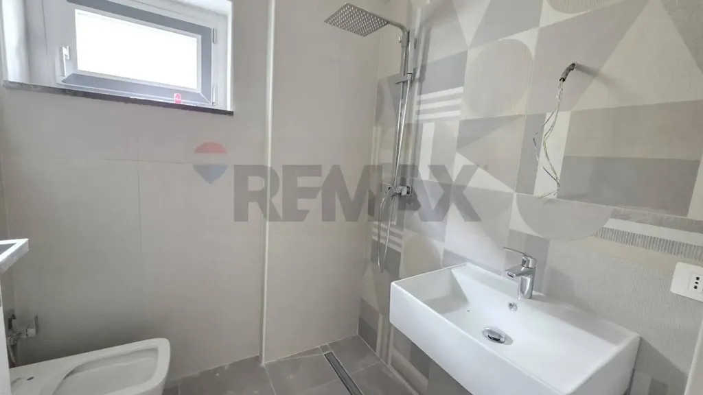 Bathrooms - Modern Apartment with Terrace in Cosenza