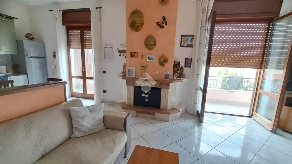 Living Room - Three-Bedroom Apartment with Fireplace in San Marcellino