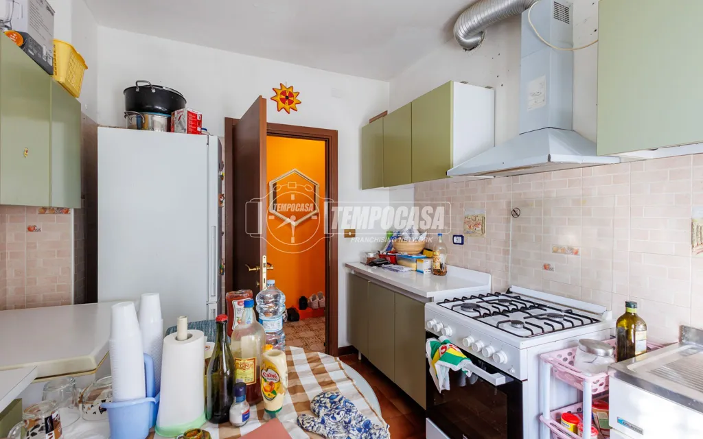Kitchen - Partially Refined Apartment with Balcony in Parma