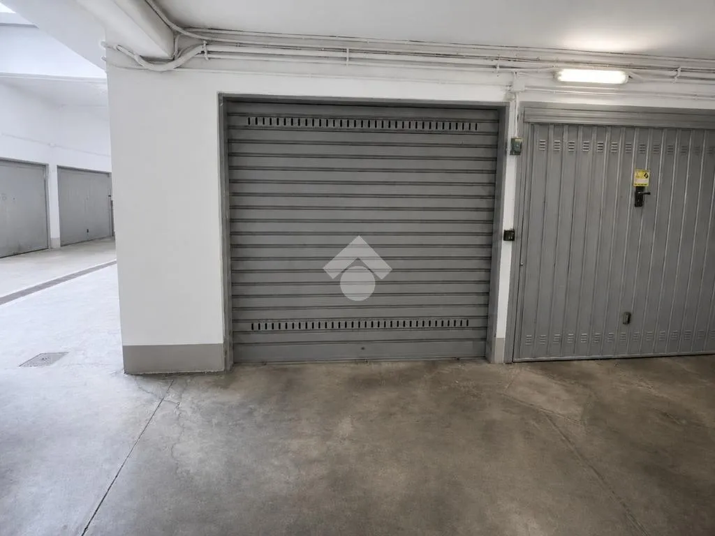 Garage - Spacious 4-Bedroom Apartment with Terrace in Milan