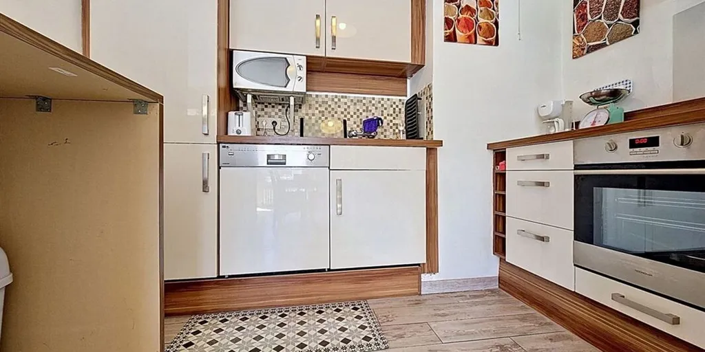 Cuisine - Appartement avec Balcon près de la Mer à De Panne