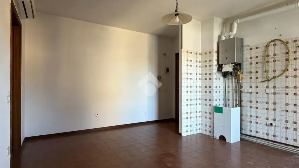 Utility Room - Two-Bedroom Apartment with Balcony in Cavriago