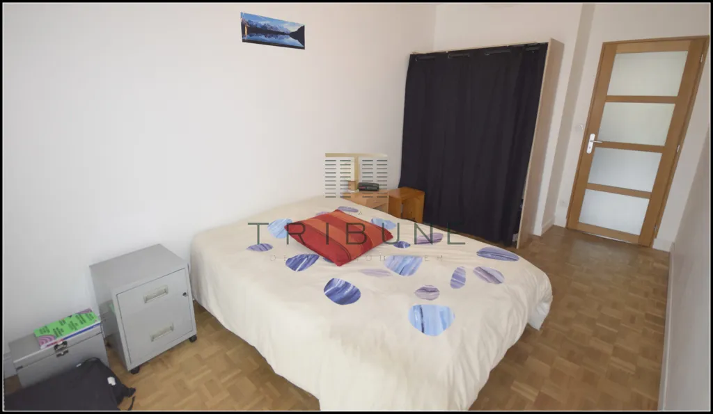 Chambres - Appartement avec Garage et Terrasse dans le Quartier Recherché