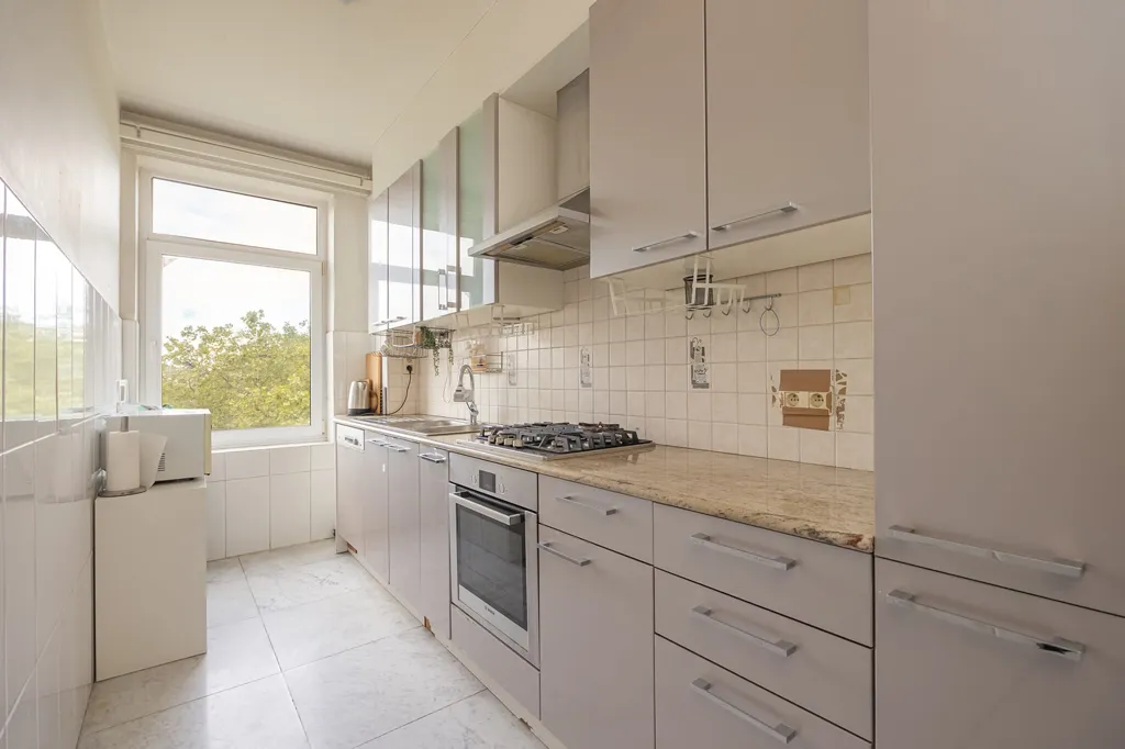 Kitchen - Renovated Apartment with Park View in Antwerp