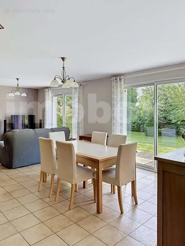 Dining Room - Architectural House with Garden in Ligné