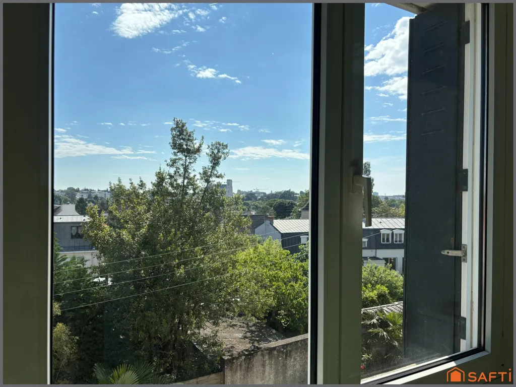 Pièces - Appartement avec Balcon et Garage au Cœur de Nantes