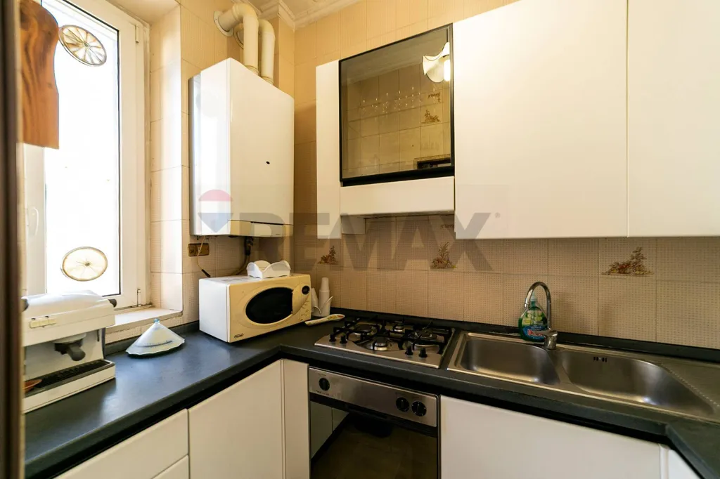 Cuisine - Bright 3-Bedroom Apartment in Bari Centre