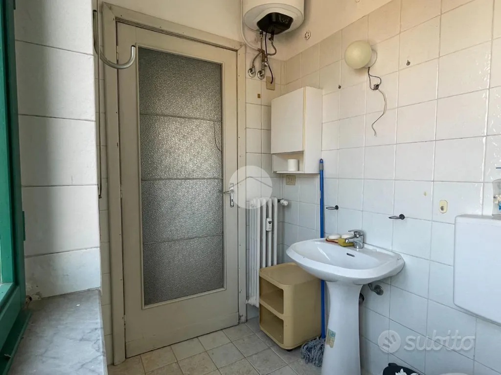 Bagni - Triplex with Balcony in Asti's Historic Centre