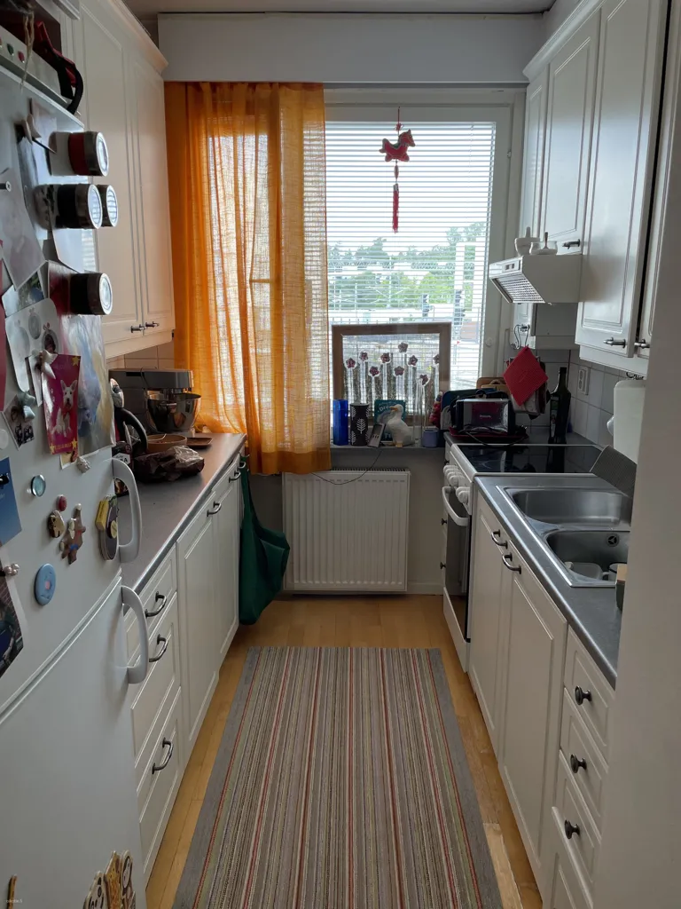 Cuisine - Modernised Apartment with Balcony in Kauniainen