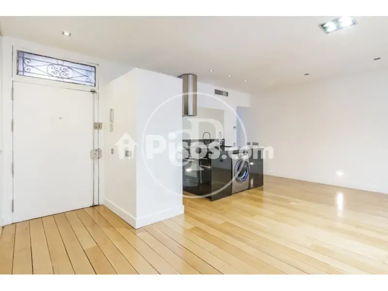 Living Room - Modern Apartment with Balcony Views in Madrid Centre
