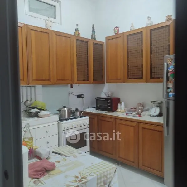 Cuisine - Three-Bedroom Apartment with Private Courtyard in Bari