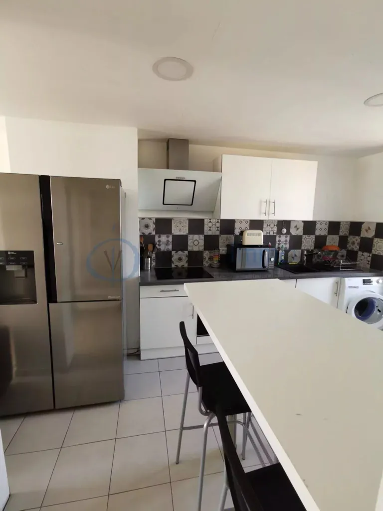 Cuisine - Appartement Rénové pour Investisseur à Proximité Universitaire