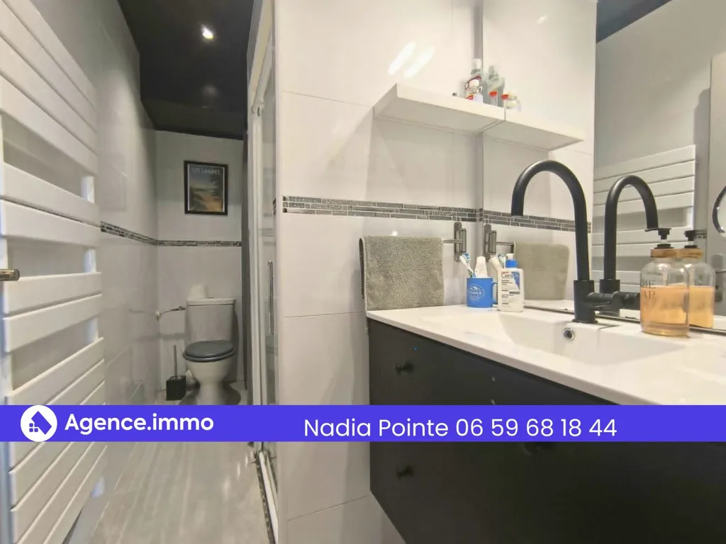 Salles de bain - Appartement avec Terrasse et Garage à Limendous