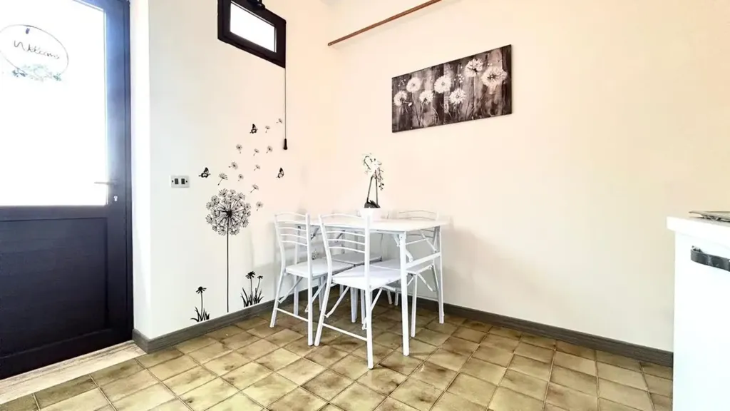 Söögituba - First Floor Apartment with Terrace in Scalea