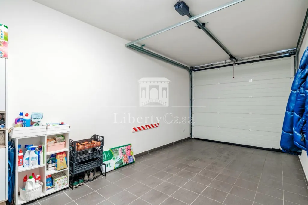Garage - Contemporary Villa with Solar Panels in Vobarno