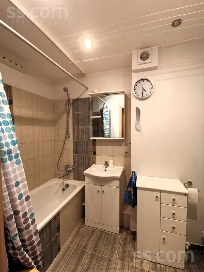 Bathrooms - Bright Apartment with Secure Parking in Riga Centre