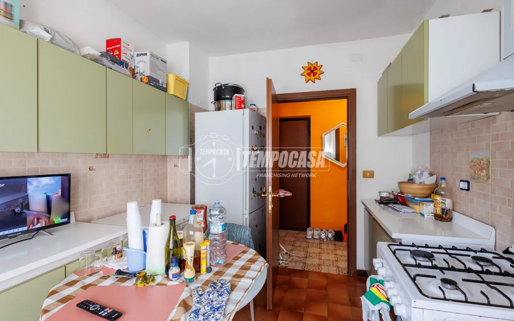 Kitchen - Partially Refined Apartment with Balcony in Parma