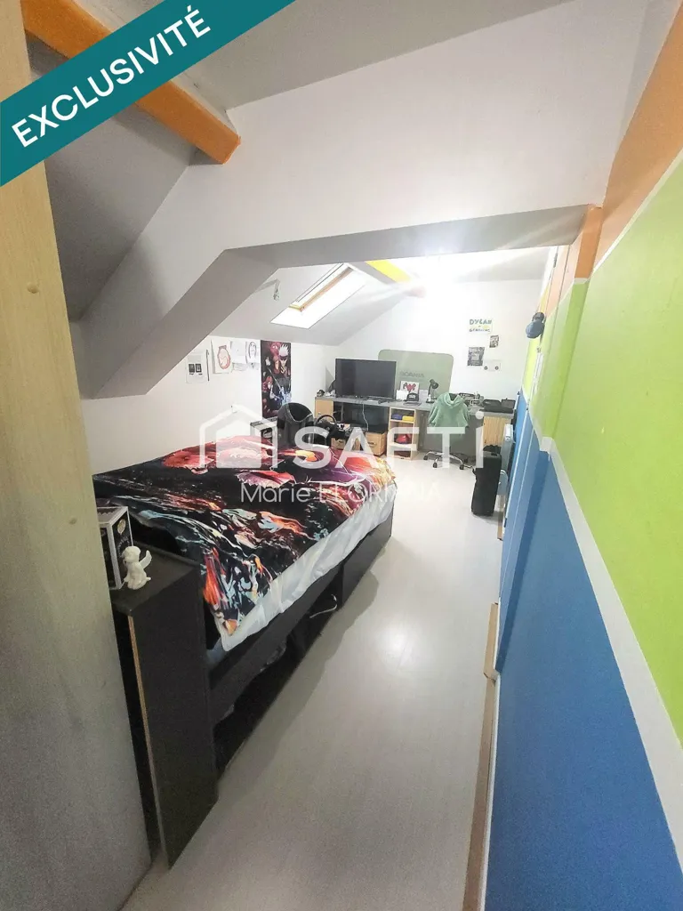 Chambres - Appartement Lumineux avec 4 Chambres à Dortan