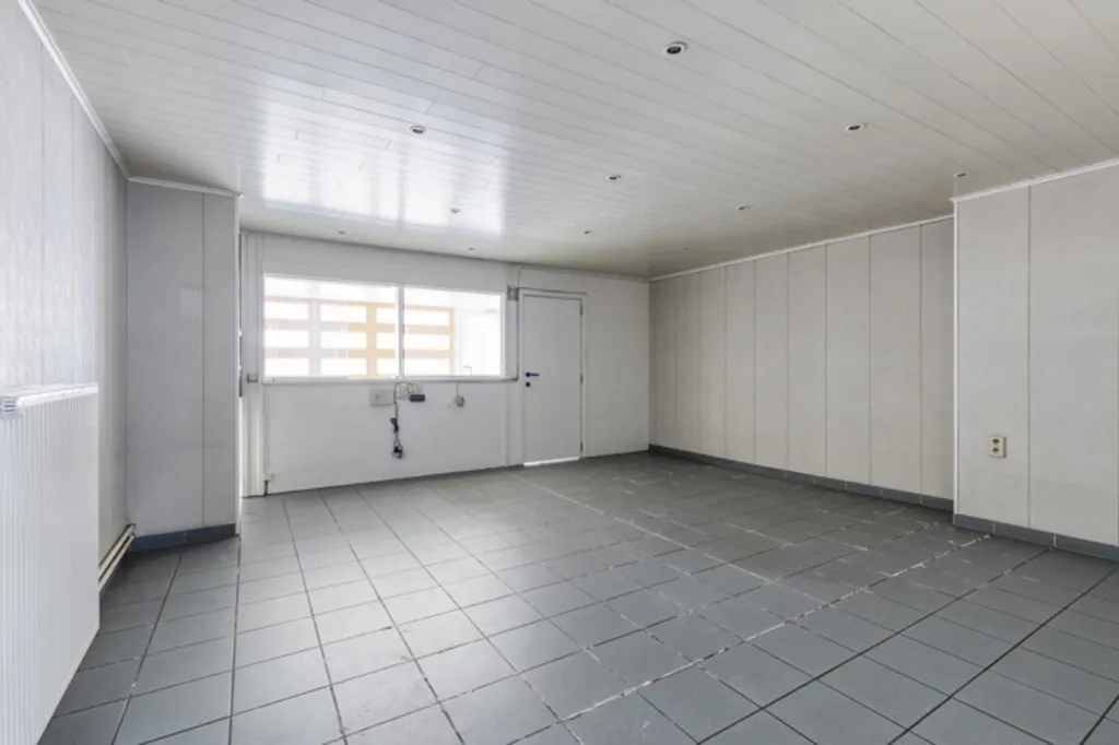 Garage - Maison Commerciale avec Terrasse au Centre d'Affligem