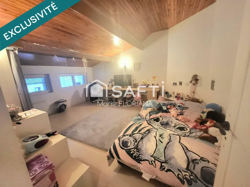 Chambres - Appartement Lumineux avec 4 Chambres à Dortan