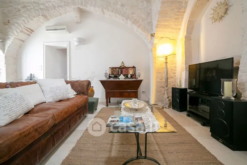 Living Room - Historic Palazzo with Panoramic View in Cisternino
