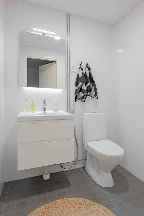Bathrooms - 3-Bedroom Apartment with Balcony in Helsinki