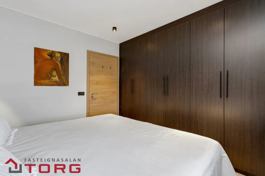 Bedrooms - Modernised Apartment with View in Grafarvogur