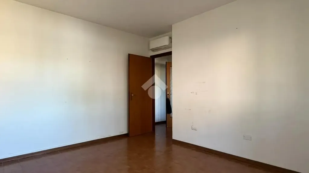 Rooms - Two-Bedroom Apartment with Balcony in Cavriago