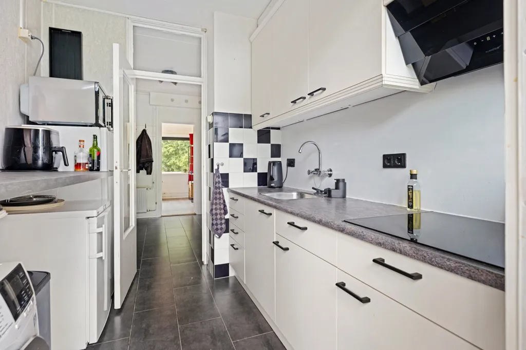 Kitchen - 3-Bedroom Apartment with Balcony in Assen