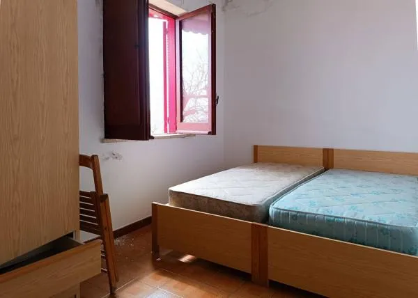Schlafzimmer - Villa Apartment with Terrace in Bonifati