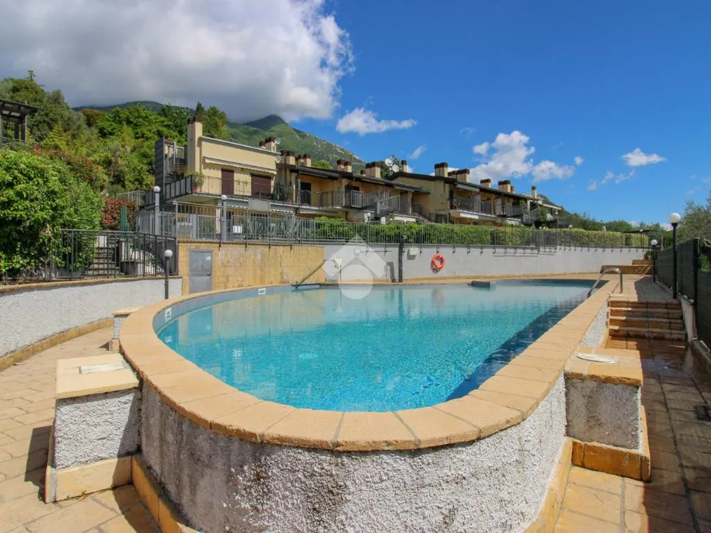 Piscine - Twin-Storey Apartment with Lake View in Vigole