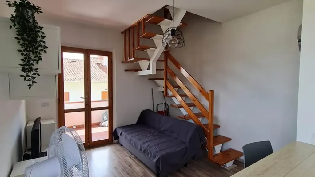 Living Room - Three-Bedroom Apartment with Balcony in Numana