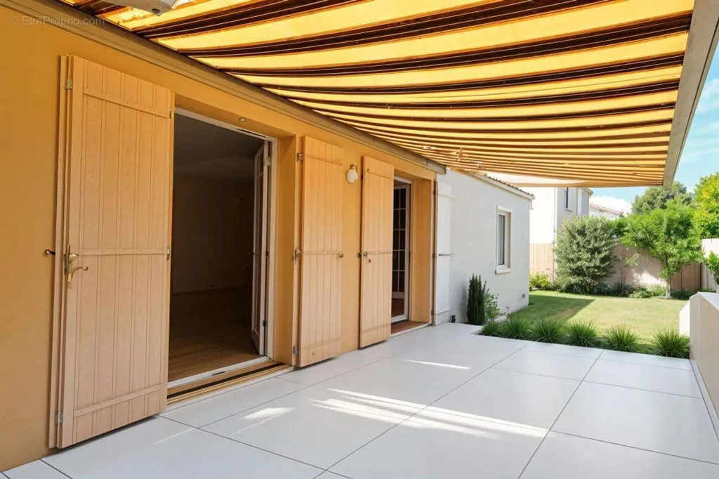 Terrasse - Maison Lumineuse avec Véranda à L'Houmeau