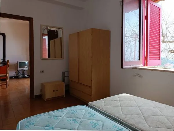 Schlafzimmer - Villa Apartment with Terrace in Bonifati
