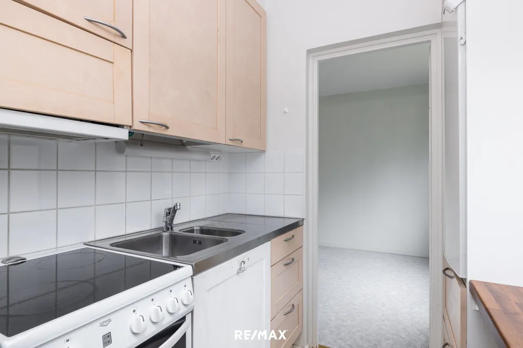 Cuisine - Bright Two-Bedroom Flat with Garden View in Kirkkonummi