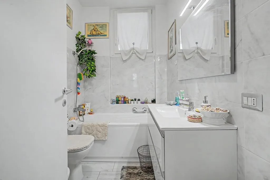 Bathrooms - Rear-Accessed Apartment with Parking in Milan